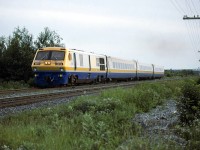 VIA 26 going slowly on the passing track at sunset to let VIA 27 go by.