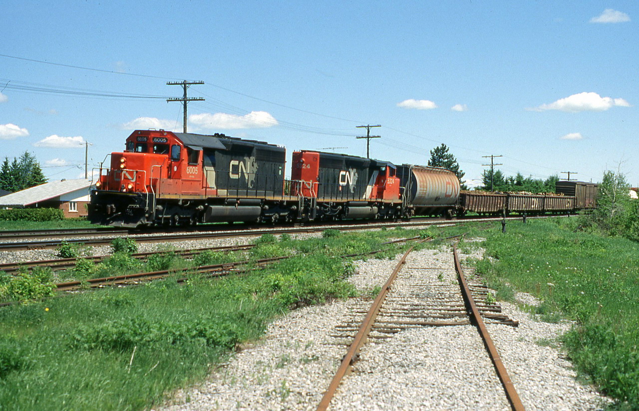 CN 133 comes out the curve with horns blaring.