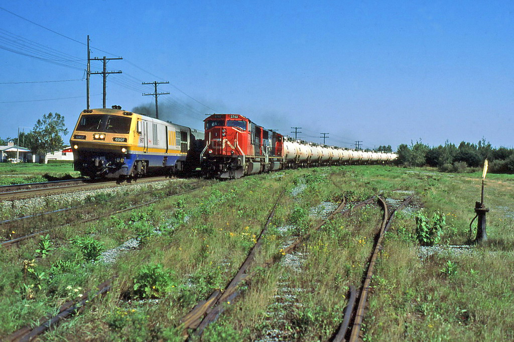 VIA 25 passes CN 783 at 75 mph.
