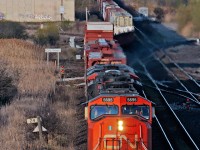 After a hectic run south on the Bala along with a pulled drawbar at Medora, CN 316 is a mile away from reaching there destination of MacMillian Yard with 9,700 + ft of train. 