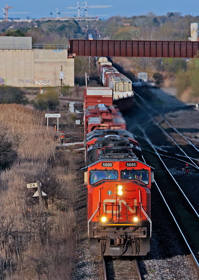 After a hectic run south on the Bala along with a pulled drawbar at Medora, CN 316 is a mile away from reaching there destination of MacMillian Yard with 9,700 + ft of train.