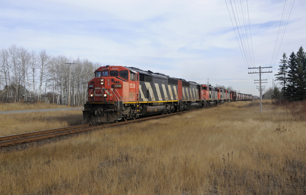 Train 437 at the Crozier crossing.  CN engine numbers 5539, 5552, 5529, 5551, 5522