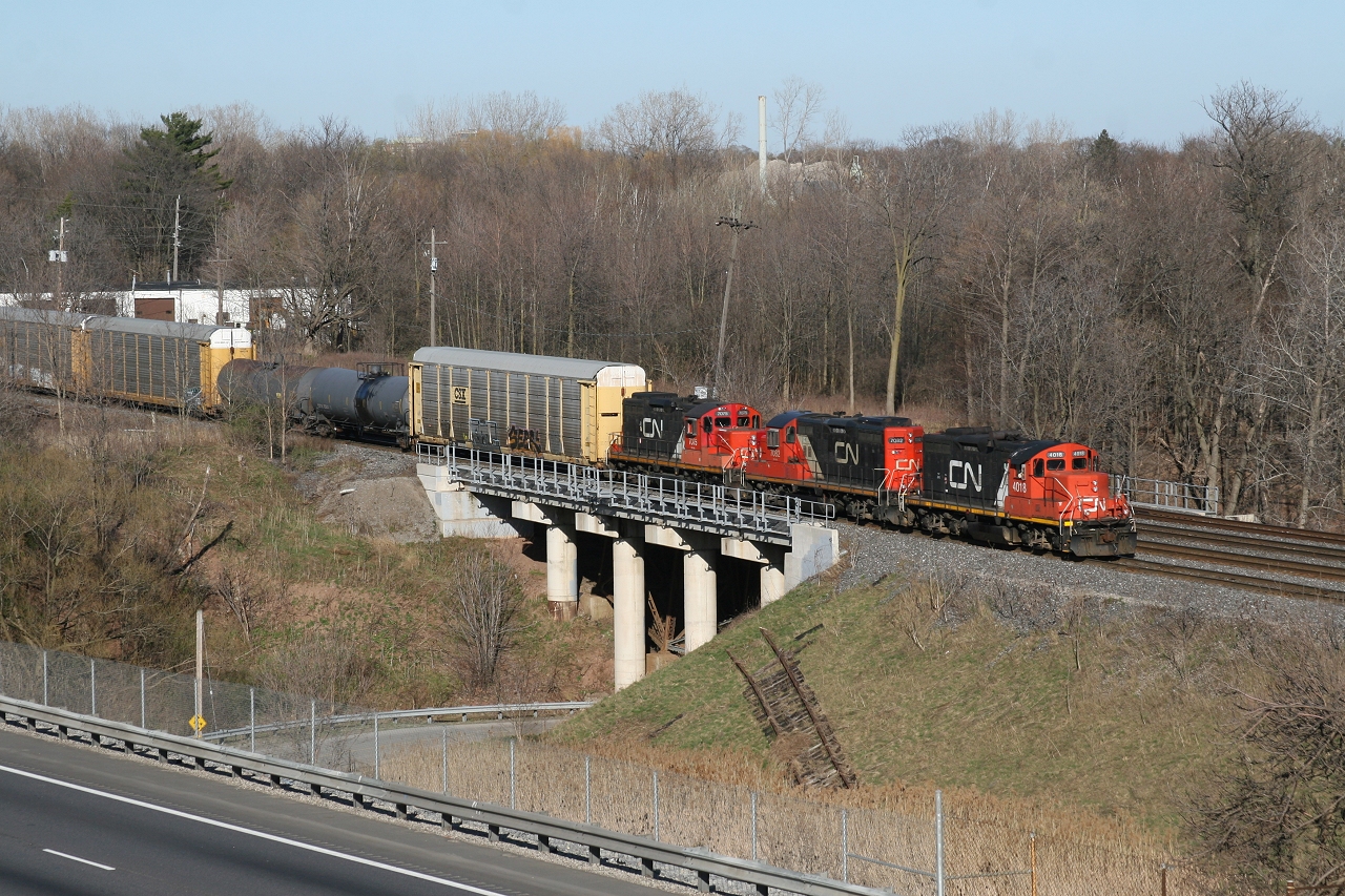 A trio of CN GP9\'s sit on the bridge over the Hidden Valley Park