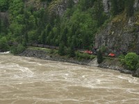 CN coal loads snake along the Fraser river through some pretty rugged terrain near Hells Gate