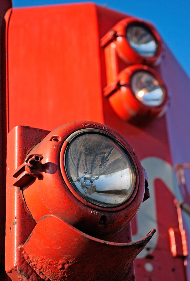 Standing guard, the conductor side ditch light of a London built GP9 awaits to be used to light up the right of way....