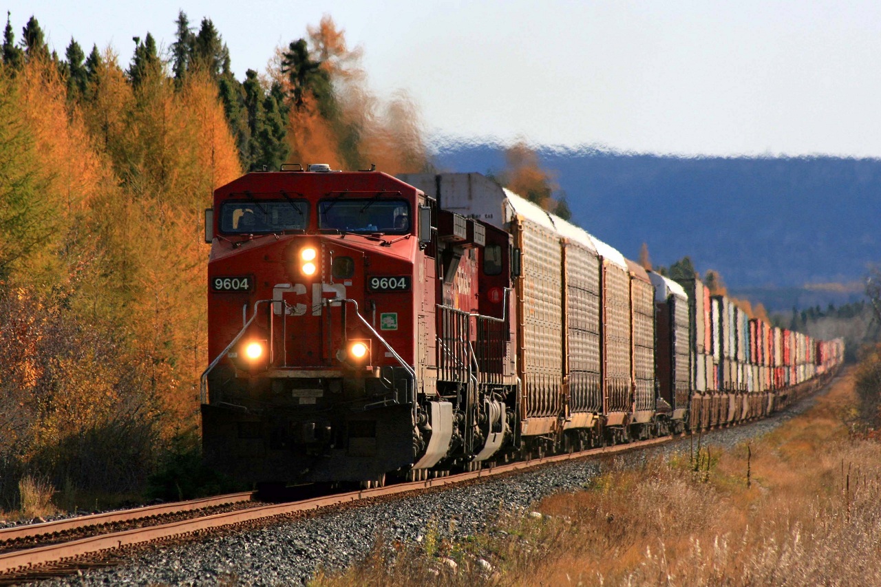 A glorious fall day greets CP 9604 with train 103 fighting the grade at mile 57.88 on the CP\'s Nipigon Sub.
