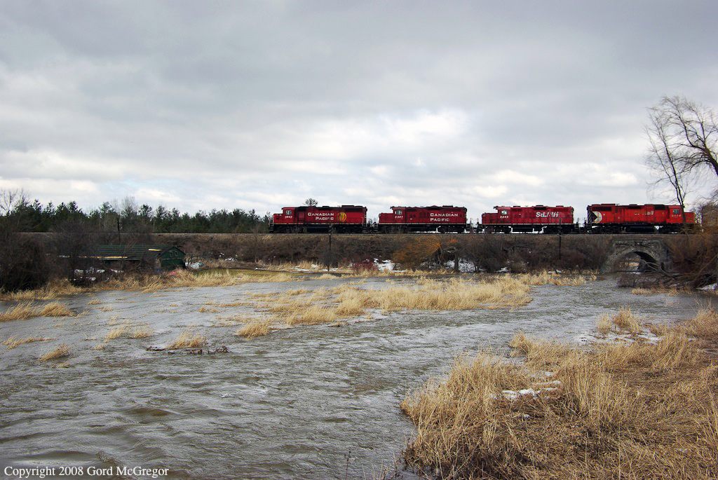 For different paint schemes lead T08 over the incredibly swollen Majors creek in Green River on April Fools Day 2008.