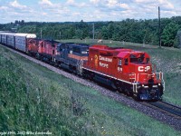 Freshly painted CP 5579 leads a motley assortment of power on 926 at Newtonville, Ontario. Trailing is HATX 517, CP 4204 and 1837, and within a month it would all be over for CP's remaining MLW fleet. Thanks to Gary Zuters for the heads up on this and a number of other notable consists as the MLW era drew to a close. 1030hrs.