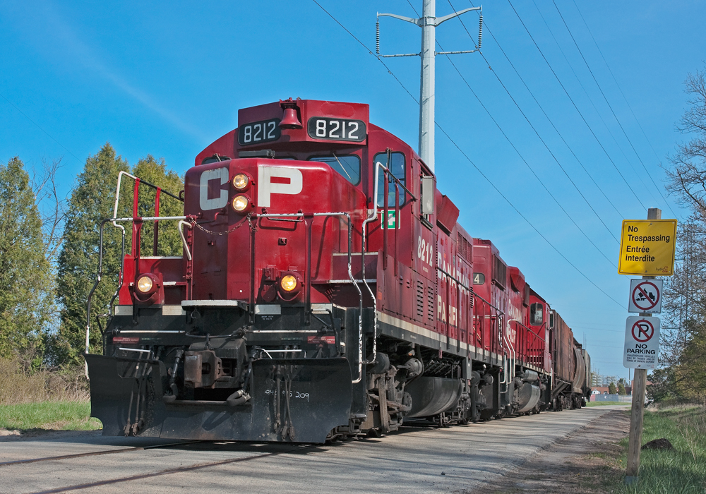 Delivery complete, the crew of the 8212 heads back north to the Expressway Yard with 8 spacer cars for Toronto Yard.