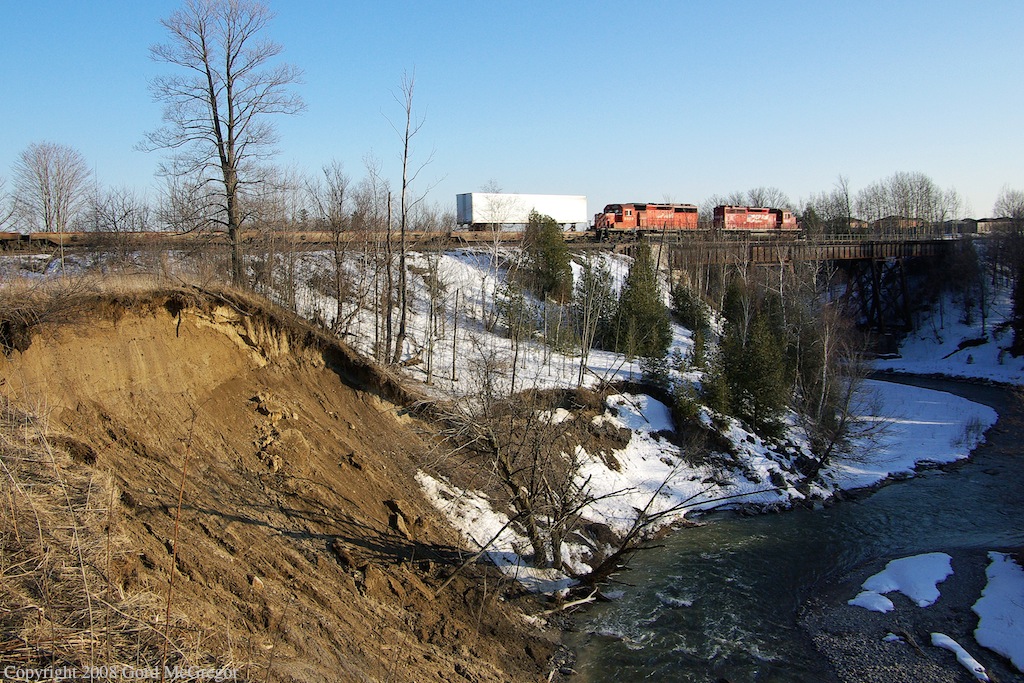 The CP expressway train crosses the Rouge River in early spring 2008.