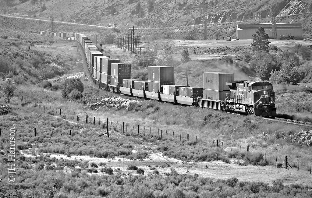 CPXE 8647 seen here between Spences Bridge and Ashcroft. Exact location unknown.