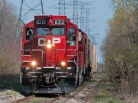 After shoving down a Schnabel car loaded with a transformer for Hydro One, the crew of the 8212 are heading back to the Expressway terminal in Hornby at a blazing 5 MPH. 