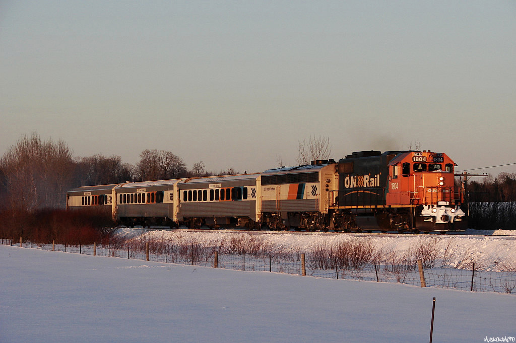 CN P69831 04 - ONT 1804 South flying by Mile 103 Newmarket sub in the last 10 seconds of sunlight for the day.