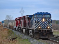 CP 244 led by a CEFX and 3 CP GEs heads eastbound thru Tilbury.
