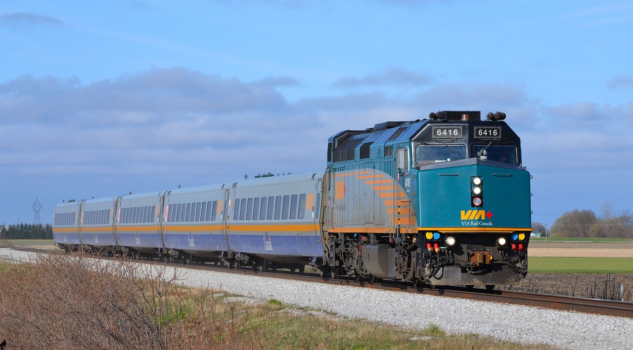VIA 72 led by rebuilt 6416 charges eastbound at VIA Drake on its approach to Chatham.