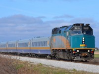 VIA 72 led by rebuilt 6416 charges eastbound at VIA Drake on its approach to Chatham.
