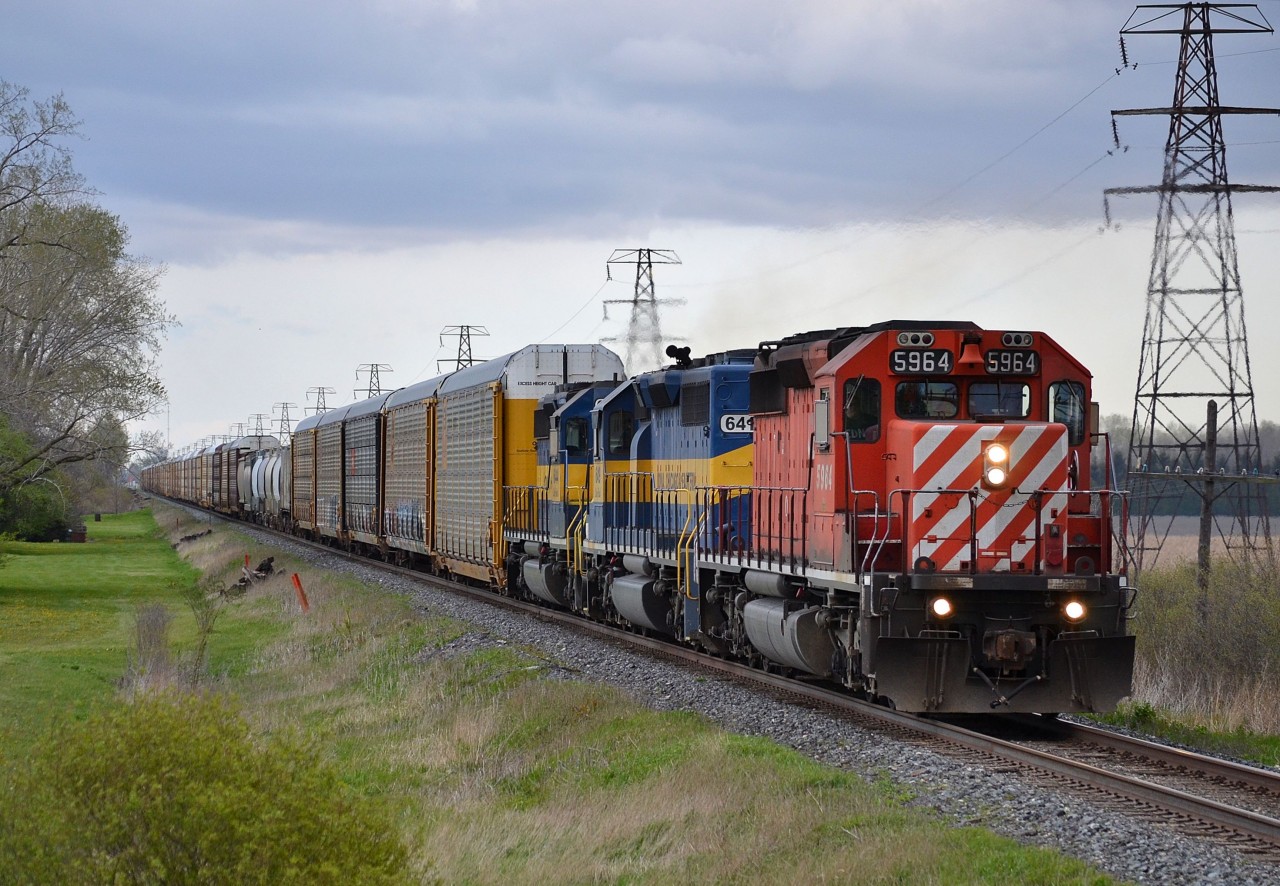 CP 147 led by an all EMD lashup of CP and ICE, heads westbound at mp 71 after just departing from the Ringold Siding.