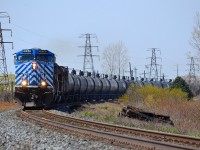 CP 640 led by CEFX 1024 along with a SOO and St.L&H, rounds the bend eastbound thru Tilbury with this ethanol train.