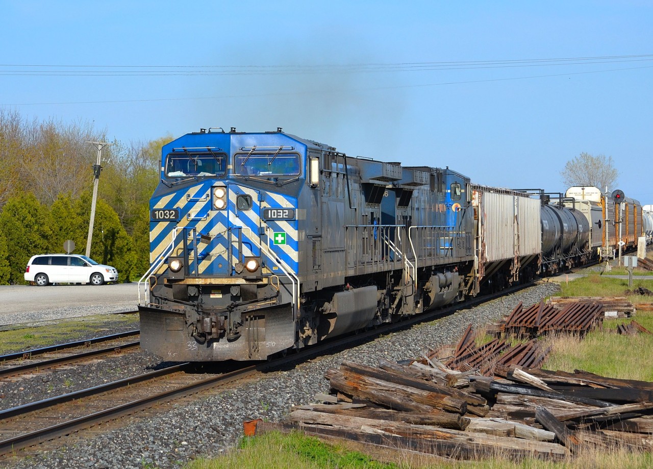 CP 441 led by a pair of CEFX, heads westbound thru Tilbury on its way towards Windsor.