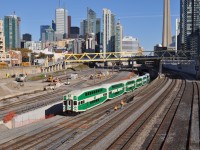 The changing eastward view from Bathurst Street: One of four images showing the changes through years: 1979, 1980's and 2011. Go Transit hourly departure on Saturday November 5, 2011. Image by S. Danko.