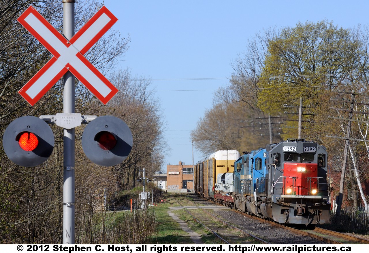 GEXR 432 at Guelph, Ontario with the latest arrival, \"GEXR 9392\" sporting a Southern Pacific paint scheme, with a few slight changes.