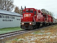 T07 using a GP9 8243 as power with 3126 and 3066 roll silently through Peterborough Ontario.