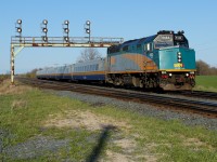 VIA 83 blasts under the signal bridge at Paris West. 