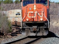 CN 5778 leads Q114 through the rocks around Coniston