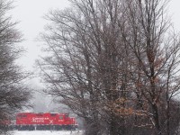 KLR T07-28 mosies through the winter landscape with primarily unimin loads from the mine in Nephton and a handful of hoppers loaded at Quaker Oats in Peterborough.