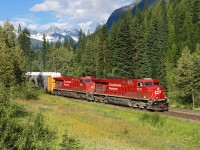 A westbound Canadian Pacific train is west of Ross Creek near the west portal of Mount Macdonald Tunnel, British Columbia.