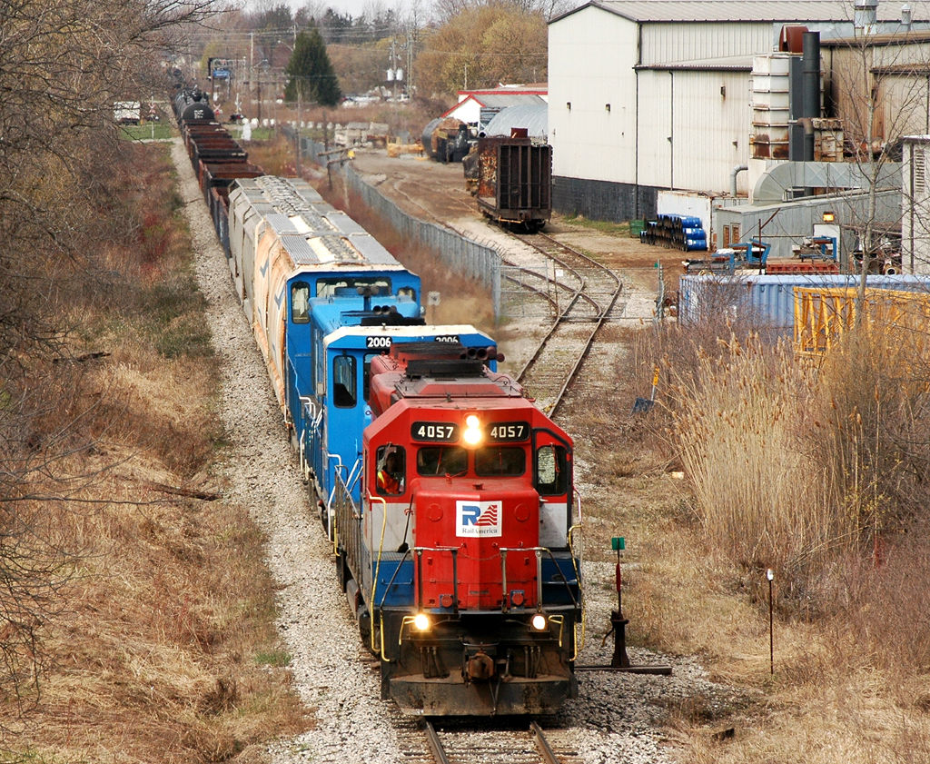 The usually nocturnal SOR 598 makes it\'s way through Cainsville with RLK 4057 - CEFX 2006 - CEFX 2014 and 81 cars