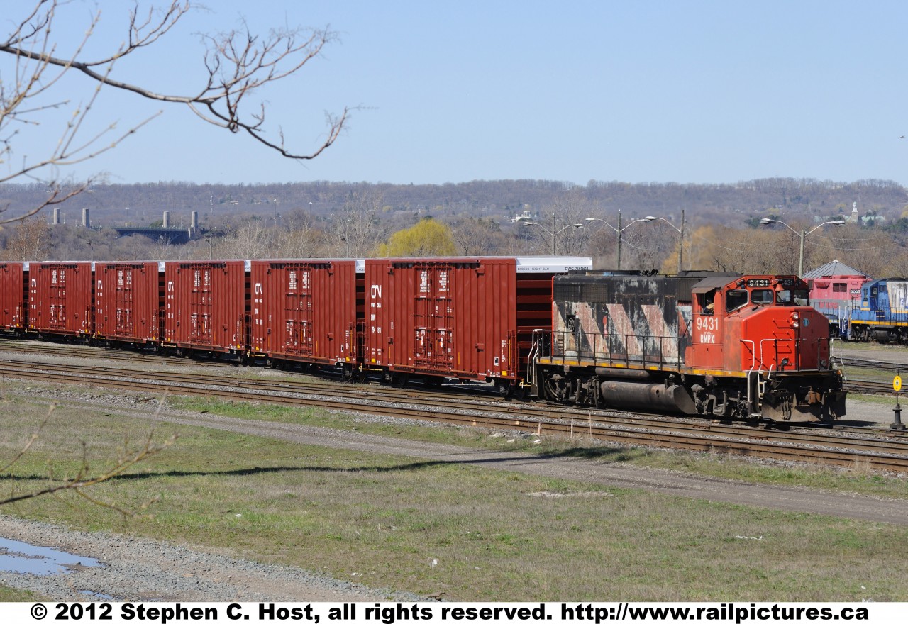 RMPX 9431 is switching a cut of new CN (DWC) boxcars fresh from the National Steel Car manufacturing facility in Hamilton, Ontario, Canada.