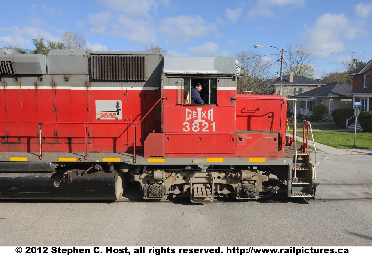 The Hogger on GEXR 3821, as train 432 looks ahead as they enter the Street Running portion of the Guelph subdivision, careful to watch for pedestrians, cars, and the upcoming work limits of a foreman.
