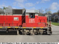 The Hogger on GEXR 3821, as train 432 looks ahead as they enter the Street Running portion of the Guelph subdivision, careful to watch for pedestrians, cars, and the upcoming work limits of a foreman.