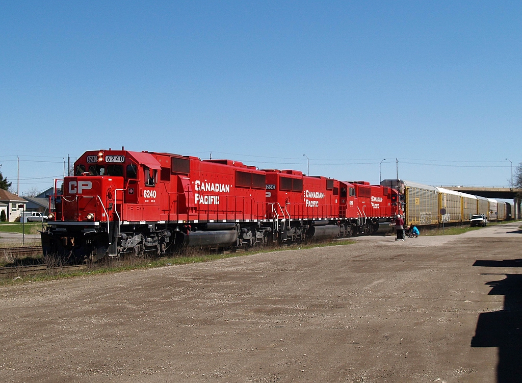 CP 147 is crossing Bond Street with 3 ex SOO rebuilds, CP 6240 - CP 6260 - CP 6254 and 64 autoracks. Tail end was by me @ 12:41.