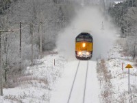 As it picks up speed just east of Rockwood, VIA 84 leave a wake of snow.