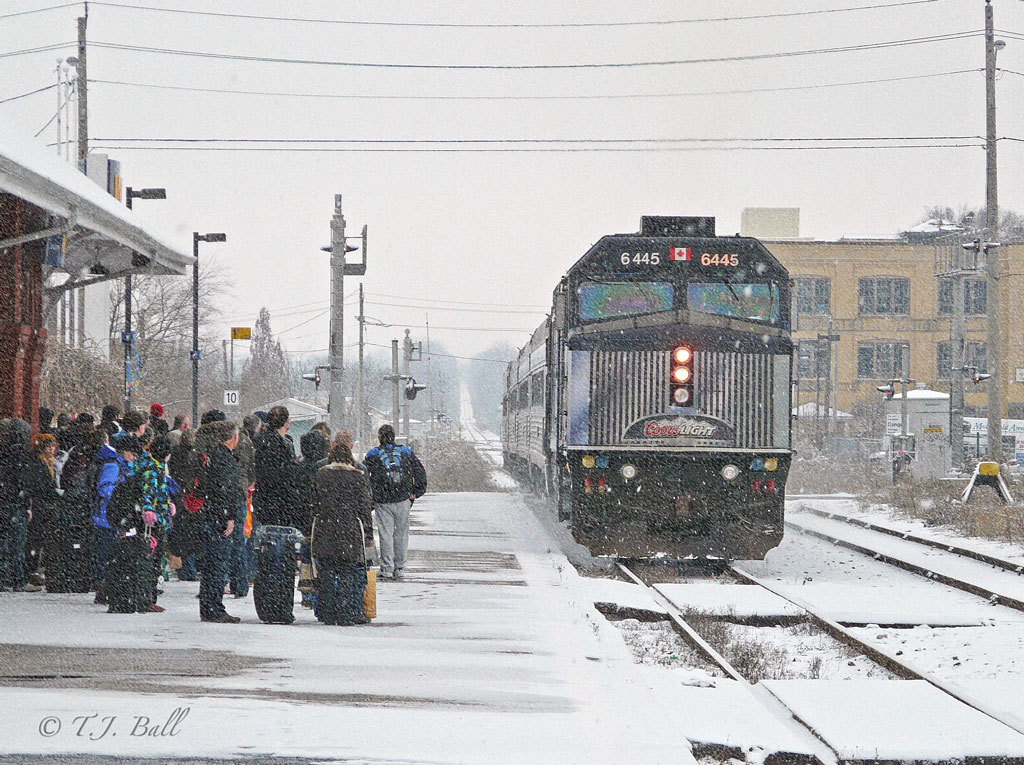 A good crowd and light snow greets the arrival of the Silver Bullet in Kitchener.