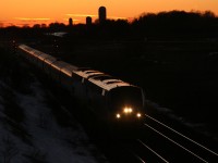 VIA 66 flies through Newtonville as the sun sets, next stop Dorval!