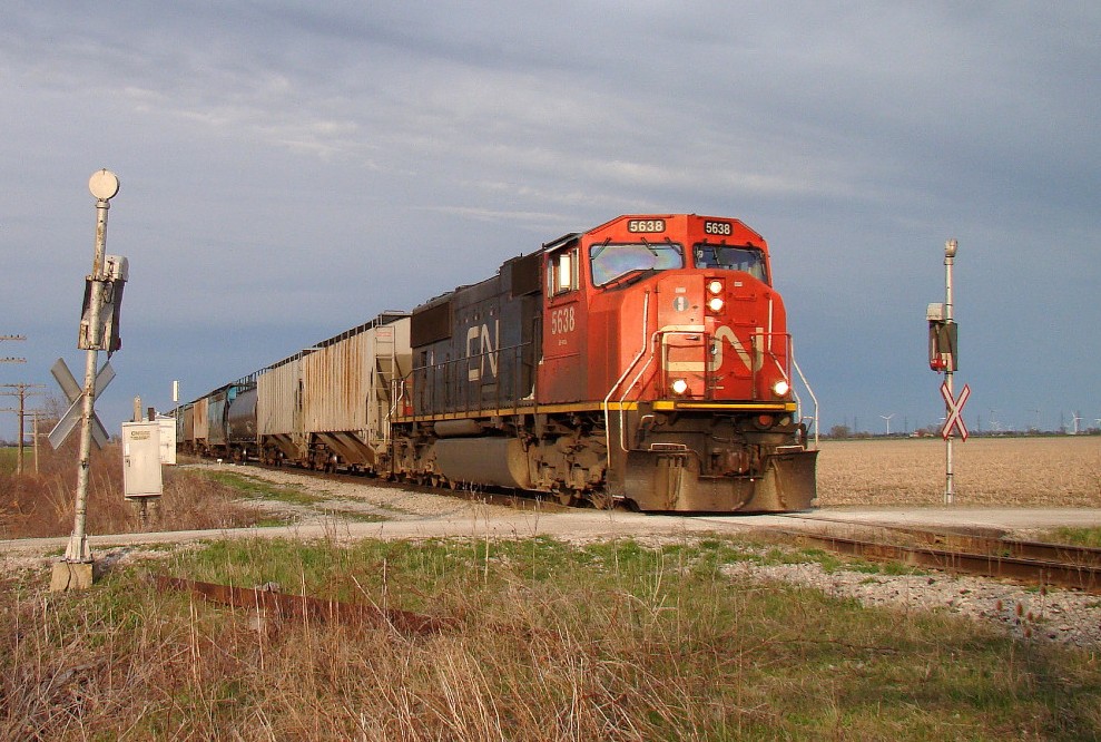 The end is near for these rails, but today is business as usual as CN 5638 leads train 439 with 25 cars through the Gleeson line Wig Wag\'s.