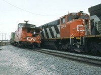 CN 306's conductor just waved the 345's crew who,ve just checked his train.
