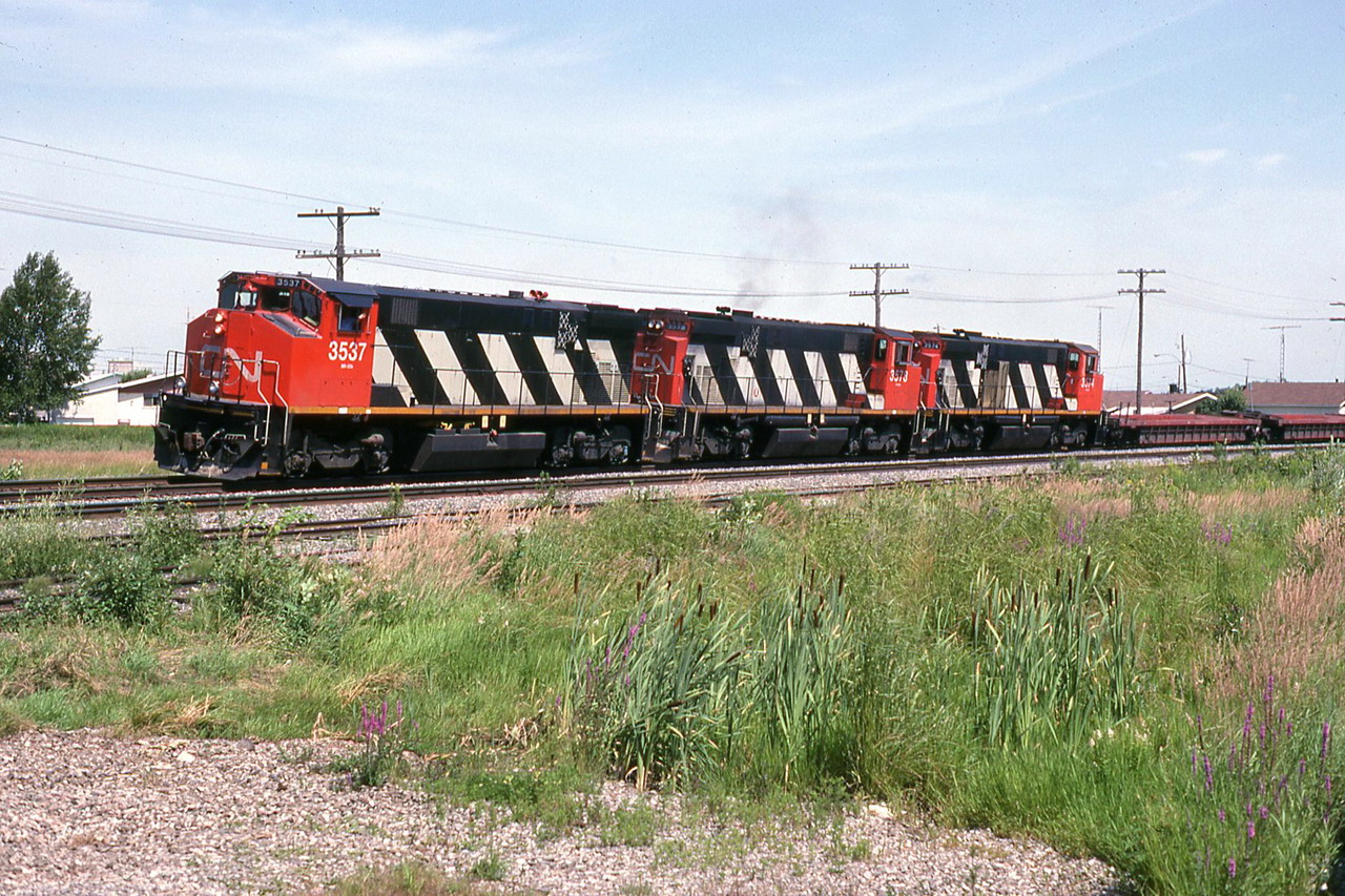 CN 231 led by 3 MR-420s 3537,3573 & 3574 on their last years of service.