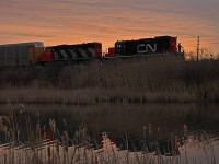 A serene moment as 7022 and 4791 work the Oakville Ford Assembly Plant at sunrise. 