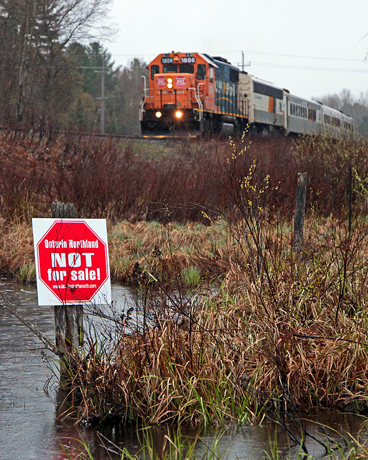 Southbound ON 1806 leading 698 passes a sign of support posted in a roadside swamp about 8 miles south of Huntsville.