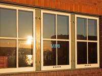 VIA doesn't serve Huntsville Staion anymore, hasn't for a long time. Sadly it will soon it will be the same with Ontario Northland. CN 4132's long hood reflects off the window pane as the sun sets on a spring day.
