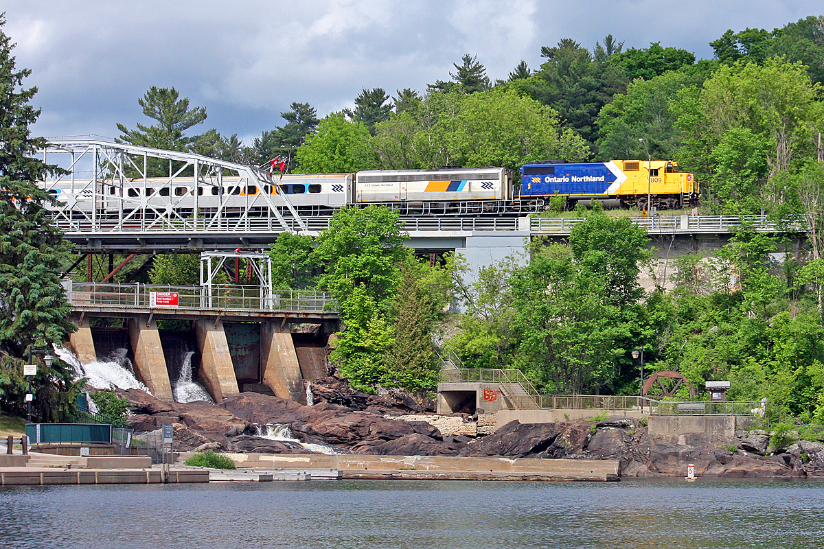 Southbound ON 698 crosses the north branch of the Muskoka River at Bracebridge Falls with shiny ON 1809 leading.
