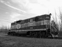 Alone and very far away from home, OBRY's former engine CCGX 1000 was moved from the Orangeville Brampton line out to a diffrent Cando operation in Bath. We see it here taking a rest and still proudly wearing its original paint scheme.