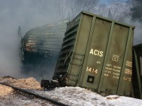 No. 12 derailed near Bucyrus account broken rail and somehow the woodchips caught fire. The woodchip cars were cut and shoved aside to get the track open ASAP.