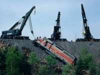 No. 12 derailed after a vandal removed a rail at Mile 4. The ACR had to call in 2 hoists from the CPR to help out on the recovery of the 182.