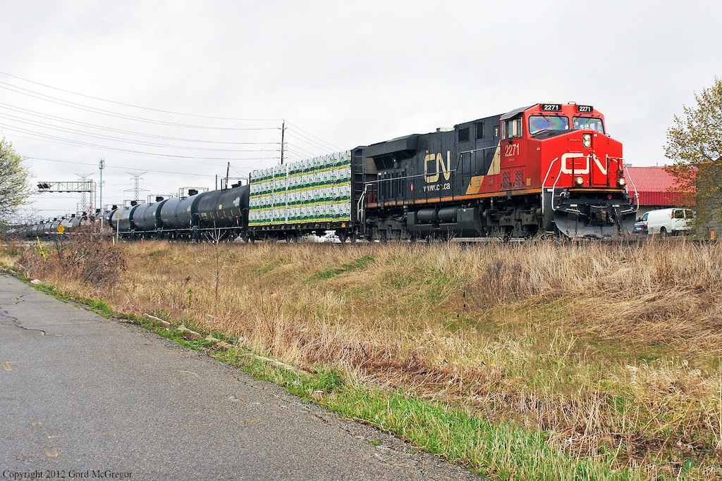 Originating in New Brunswick 305 has the usual tanks and New Brunswick Lumber on the head.