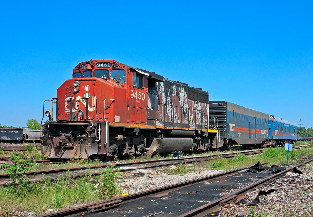 On Saturday May 19, CN 484 is tucked away at the old CN Hamilton Shops in Hamilton after testing the North and No 1 track of the Halton Sub from Mac Yard to Burlington West then the North Track from Bayview to Ridout on the Dundas Sub, the train wyed at London and proceeded east testing the South Track from Ridout to Bayview. Twas a nice run majority of it being track speed so here I take a photo of my test train as I bid it adieu for the taxi cab ride back to Toronto.